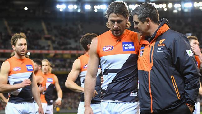 Giants coach Leon Cameron (right) consoles Ryan Griffen after the semi-final loss to Collingwood last Saturday night. Picture: Getty Images