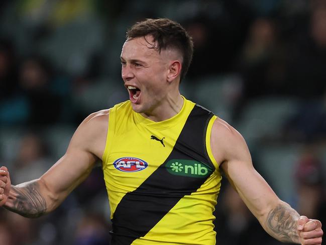 Rhyan Mansell of the Tigers celebrates a goal, Photo by James Elsby/AFL Photos via Getty Images.