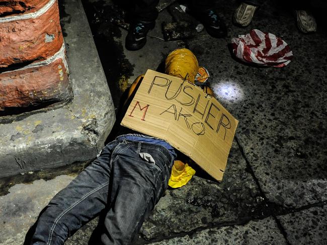 Like many others, this alleged drug dealer was found executed with his hands bound and his head wrapped in tape. Picture: Getty Images