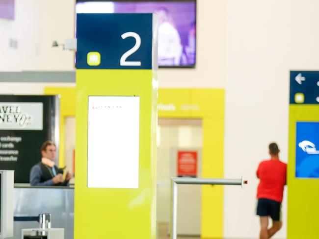 Darwin International Airport almost deserted  in between the hours of 12 and I Pm , usually a busy time for arrivals and departures Picture GLENN CAMPBELL