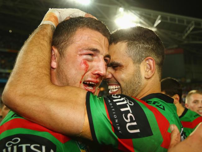 Sam Burgess and Greg Inglis of the Rabbitohs celebrate victory during the 2014 NRL Grand Final against the Bulldogs. (Photo by Mark Kolbe/Getty Images)