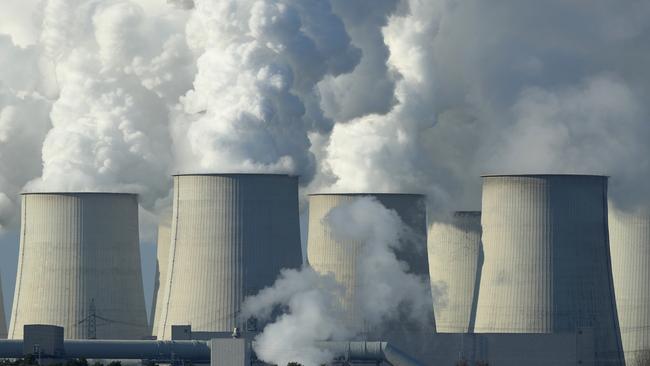 Steam rises from the cooling towers of the Jaenschwalde coal-fired power plant near Peitz, Germany. Picture: Getty Images