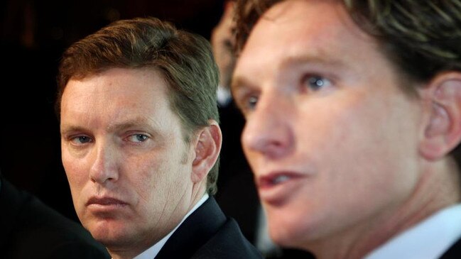 David Evans with James Hird on the day the Brownlow medallist was announced as coach in 2010.