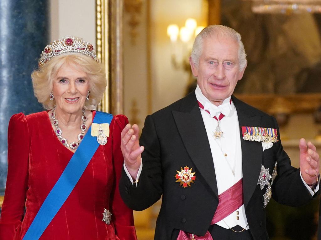 King Charles, seen here with Queen Camilla, reportedly gives staff “funny little things” for Christmas. Picture: Yui Mok / POOL / AFP