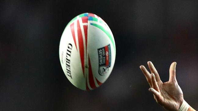 HONG KONG, HONG KONG - APRIL 05: Sione Molia of New Zealand passes the ball away on day one of the Cathay Pacific/HSBC Hong Kong Sevens at the Hong Kong Stadium on April 05, 2019 in Hong Kong. (Photo by Hannah Peters/Getty Images)