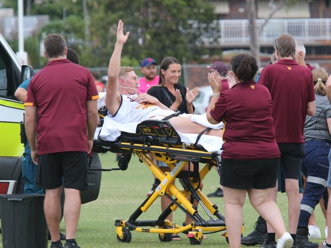 Jon Croad being stretchered from the field after his horror injury. Pic Mike Batterham