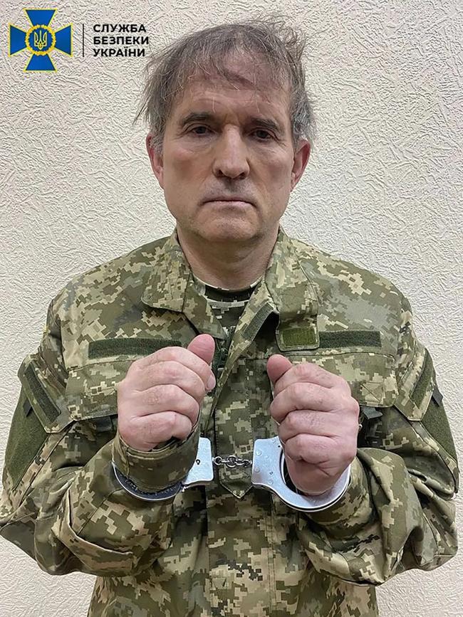 Vladimir Putin’s close friend Viktor Medvedchuk is seen handcuffed after a special operation was carried out by Security Service of Ukraine in Ukraine. Picture: Anadolu Agency via Getty Images