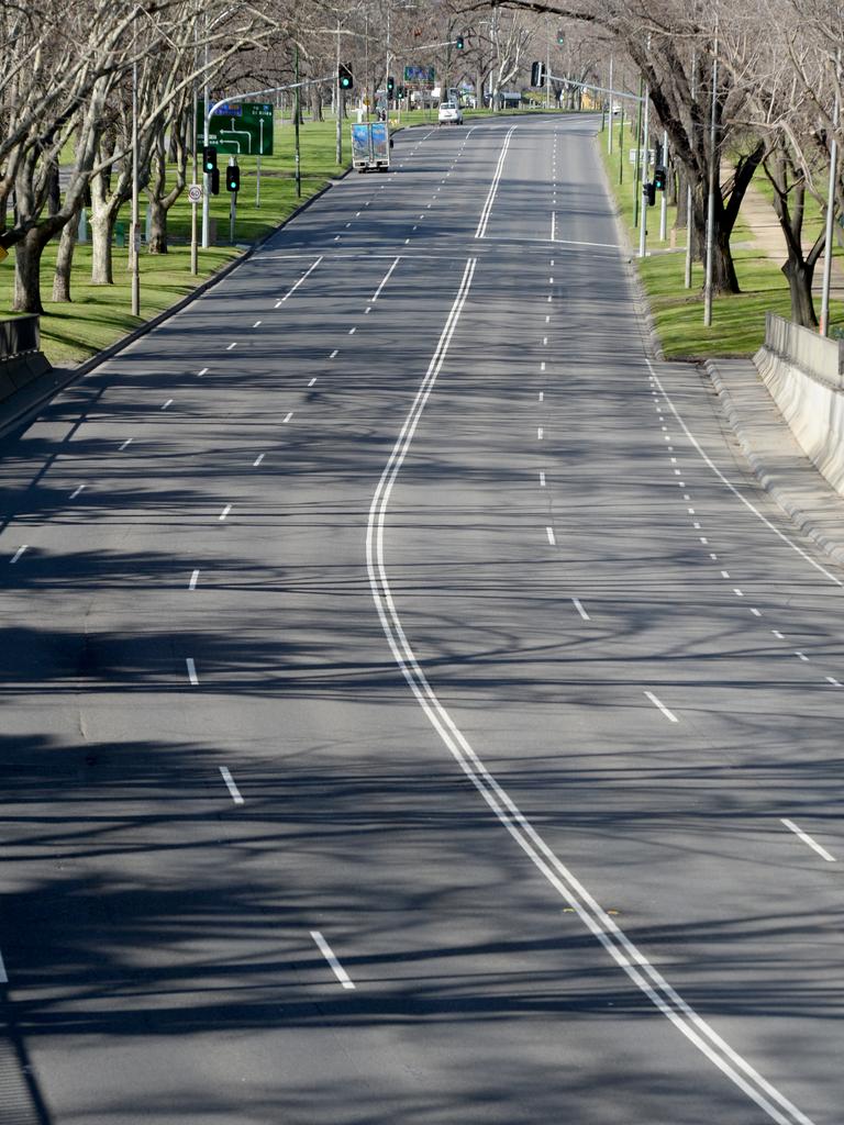 Eerie scenes on Melbourne’s empty roads. Picture: Andrew Henshaw