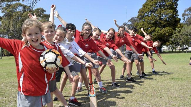 Kids from Iluka Public School will enjoy playing sports on Ken Leeson Oval even more after an upgrade. Picture: Ebony Stansfield