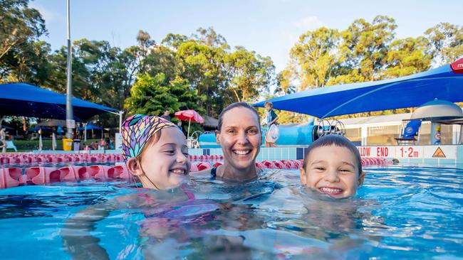 Former Olympic gold medallist Susie O'Neill with junior swim squad members Georgia Cooke, 7, and Arthur Joseph, 5, at Yeronga Park Swimming Pool. Picture by Luke Marsden.