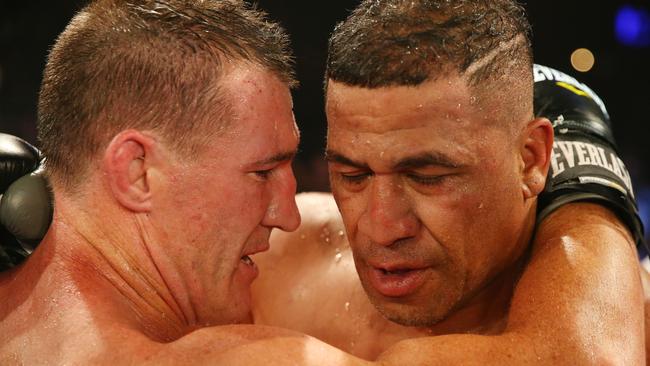 Paul Gallen showed care for John Hopoate after their fight in Sydney. (Photo by Jason McCawley/Getty Images)