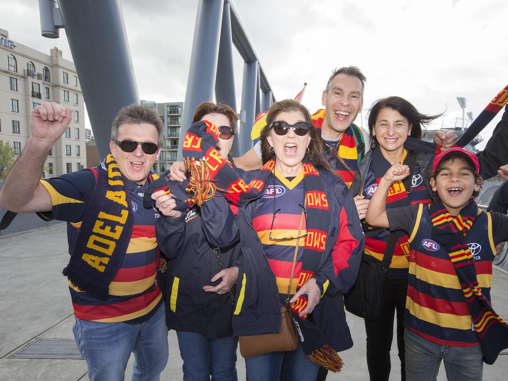 Crows fans start flocking to the MCG for the 2017 AFL Grand Final against the Tigers. L-R Kym and Vicki Penhall, Angela Prestwich, Pete and Biljana Podias with son Aleksander, 9. Picture: Sarah Matray