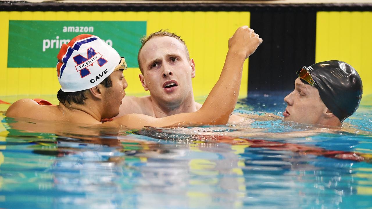 (L-R) Daniel Cave comforts Matthew Wilson distraught after just missing out on qualifying in the Men's 200 metre Breaststroke final with winner Zac Stubblety-Cook. Picture: Mark Brake/Getty Images