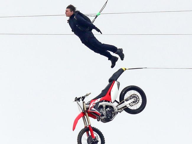 ONE TIME WEB USE ONLY - FEES APPLY FOR REUSE -  EXCLUSIVE: **PREMIUM EXCLUSIVE RATES APPLY** Tom Cruise was seen filming an incredibly dangerous stunt for Ã¢â¬ÅMission Impossible 7" in the Oxfordshire countryside. Tom is notorious for filming his own stunts, and once again provided his fearless nature. Only days earlier a stunt actor performed this same scene which ended badly with his bike exploding after a leap from the exact same ramp. That incident caused no injuries, however a source said it was a 'total catastrophe'.  Local resident Martin Woods who lives next door to the film set said Ã¢â¬Åit was just unbelievable to see him flying from a bike into the sky like that, nothing ever happens here and now Hollywood has arrived Ã¢â¬Å  The ÃÂ£2million set is sure to be a huge hit with fans around the world and will no doubt be one of the best opening scenes for the Mission Impossible franchise.  *VIDEO ALSO AVAILABLE*  Pictured: Tom Cruise Ref: SPL5182083 150820 EXCLUSIVE Picture by: Valentine/Bridger/Dean / SplashNews.com  Splash News and Pictures USA: +1 310-525-5808 London: +44 (0)20 8126 1009 Berlin: +49 175 3764 166 photodesk@splashnews.com  World Rights   Picture: Splash News/Media Mode