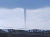 ‘Wow, swirly thing alert!’: Wild waterspout spotted off Qld coast