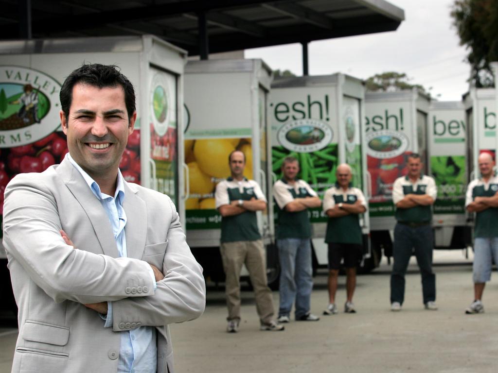 Bill Kollatos with his team of drivers and trucks.