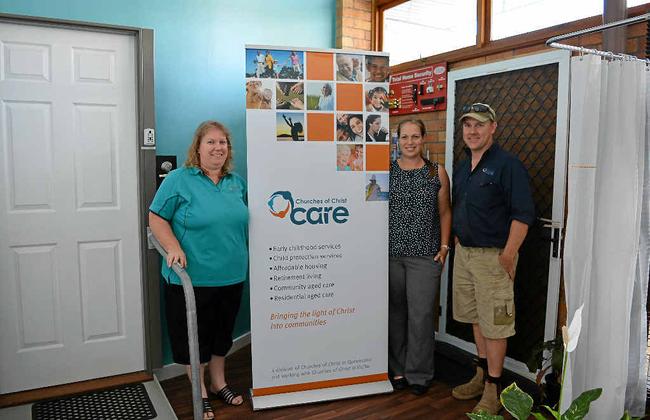 CARE OPTIONS: Churches of Christ Care Warwick staff Leanne Lockhart, Katie Rutledge and Todd Brown with the display of some of the many modifications available. Picture: Samantha Oneil