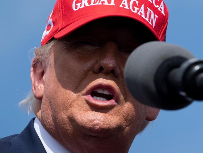 US President Donald Trump speaks at a "Make America Great Again" rally at Raymond James Stadium's parking lot on October 29, 2020, in Tampa, Florida. (Photo by Brendan Smialowski / AFP)