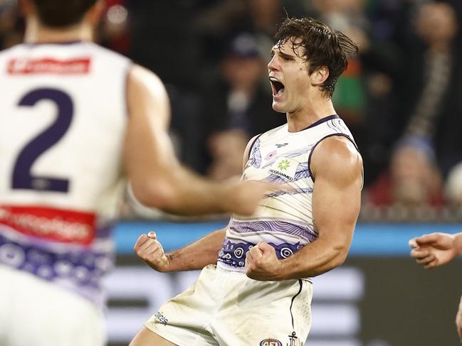 MELBOURNE, AUSTRALIA - MAY 28: Lachie Schultz of the Dockers celebrates a goal  during the round 11 AFL match between the the Melbourne Demons and the Fremantle Dockers at Melbourne Cricket Ground on May 28, 2022 in Melbourne, Australia. (Photo by Darrian Traynor/Getty Images)