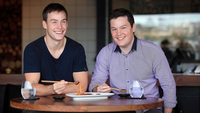 Great steak: Luke Keary and brother Ben (right) tuck into the $450/kg Wagyu cut, at Vic’s Meat Market in Pyrmont. Picture: Sam Ruttyn