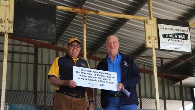 Rotary president Doug Bryce with Show and Rodeo president Gerard O’Leary.