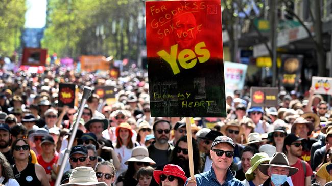 Crowds march during a Walk for Yes rally in Melbourne.