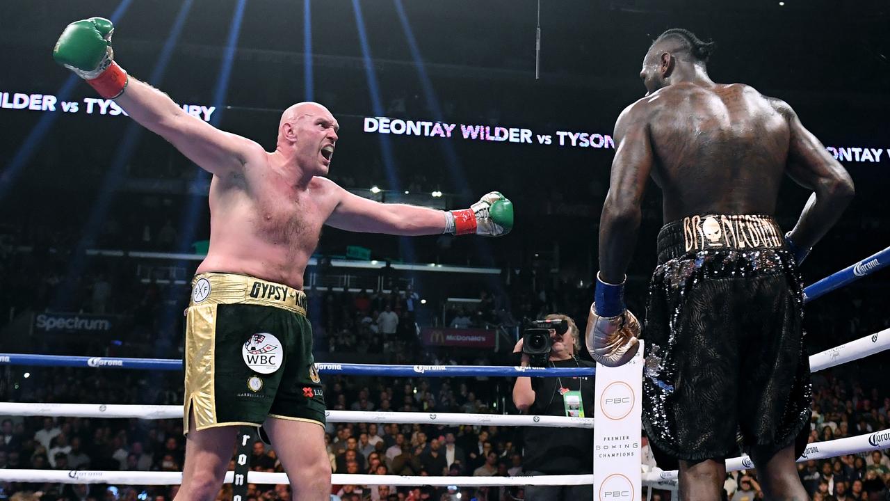 LOS ANGELES, CA - DECEMBER 01: Tyson Fury taunts Deontay Wilder fighting to a draw during the WBC Heavyweight Championship at Staples Center on December 1, 2018 in Los Angeles, California. (Photo by Harry How/Getty Images)