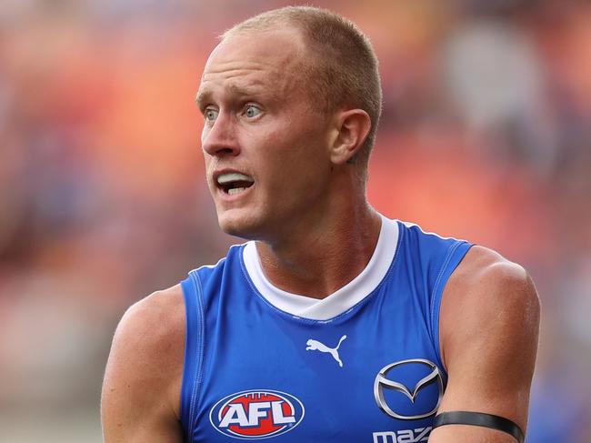 SYDNEY, AUSTRALIA - MARCH 16: Jaidyn Stephenson of the Kangaroos runs the ball during the round one AFL match between Greater Western Sydney Giants and North Melbourne Kangaroos at ENGIE Stadium on March 16, 2024 in Sydney, Australia. (Photo by Jason McCawley/AFL Photos/via Getty Images )