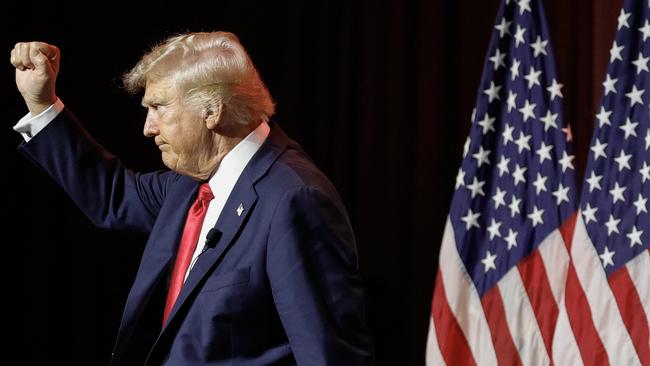 Former US President and 2024 Republican presidential nominee Donald Trump gestures as he departs after answering questions during the National Association of Black Journalists annual convention in Chicago, Illinois, on July 31, 2024. (Photo by KAMIL KRZACZYNSKI / AFP)