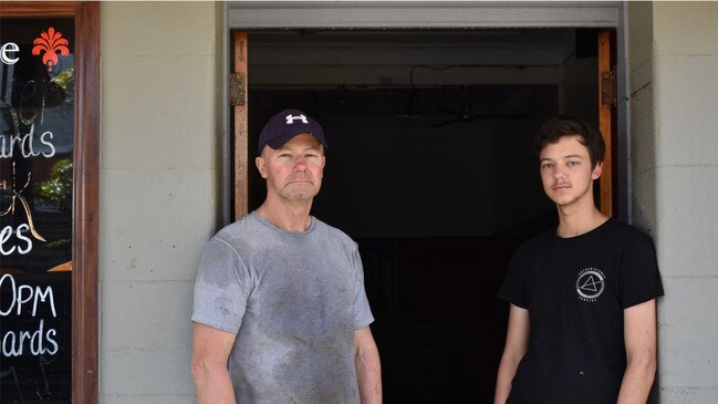 Empire Hotel owner Craig Mylrea (left) and his son Zane Mylrea (right) were trapped above their business in complete darkness with food running low as the pub below went under.