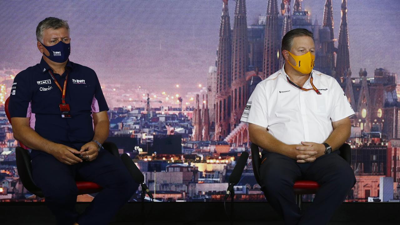 McLaren boss Zak Brown with Otmar Szafnauer. Photo by Andy Hone/Pool via Getty Images