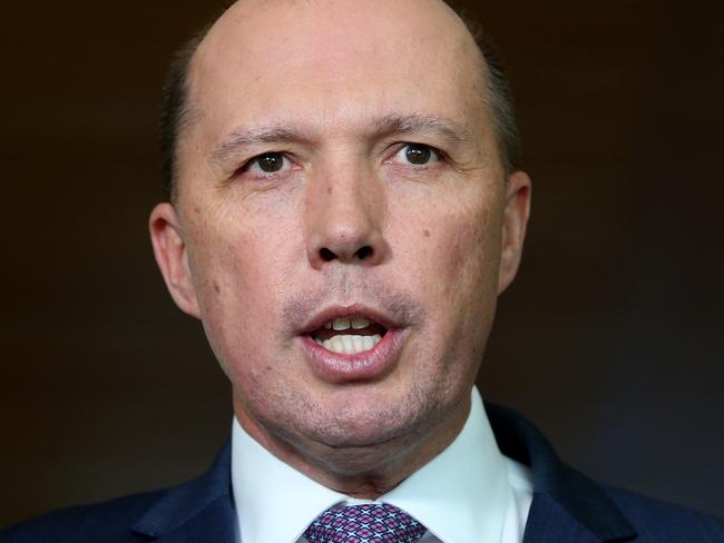 Immigration Minister Peter Dutton speaking at a press conference at Parliament House in Canberra. Picture Kym Smith