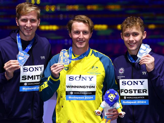 BUDAPEST, HUNGARY - DECEMBER 12:  Mens 400m Freestyle medalists Kieran Smith, Elijah Winnington and Carson Foster during day three of the World Aquatics Swimming Championships (25m) 2024 at Duna Arena on December 12, 2024 in Budapest, Hungary. (Photo by Dean Mouhtaropoulos/Getty Images)