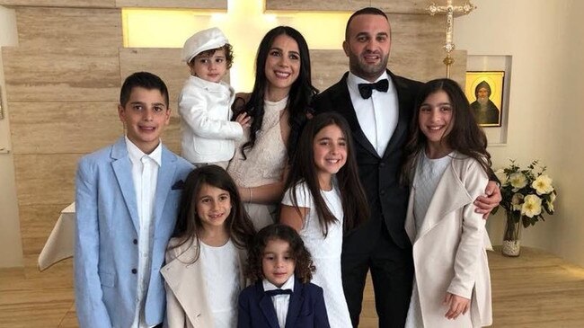 Antony Abdallah (left), Sienna Abdallah (second left on bottom), and Angelina Abdallah (right) with their parents Leila and Daniel.