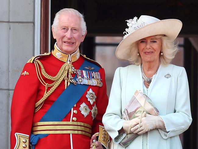 LONDON, ENGLAND - JUNE 15: Queen Camilla and King Charles III during Trooping the Colour at Buckingham Palace on June 15, 2024 in London, England. Trooping the Colour is a ceremonial parade celebrating the official birthday of the British Monarch. The event features over 1,400 soldiers and officers, accompanied by 200 horses. More than 400 musicians from ten different bands and Corps of Drums march and perform in perfect harmony. (Photo by Chris Jackson/Getty Images)