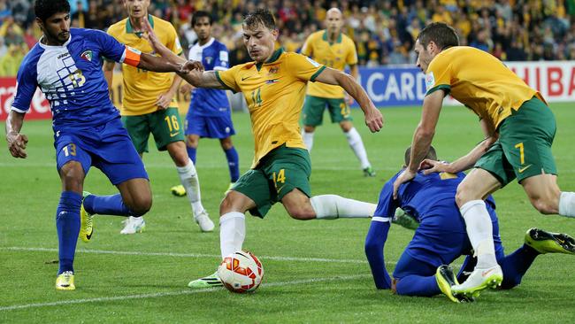 James Troisi scores for the Socceroos during the Asian Cup in 2015. Picture: Colleen Petch.