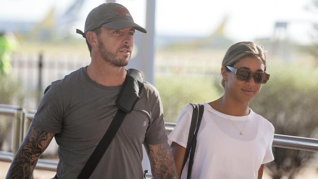 Former NT police officer Rolfe and his girlfriend arrive in Alice Springs on Sunday evening ahead of giving evidence at the inquest into the death of Kumanjayi Walker. Picture: Liam Mendes