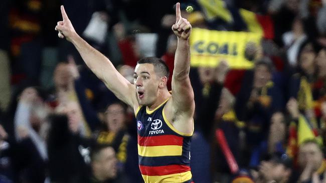 Walker celebrates a goal during the come-from-behind win over West Coast. Picture: Sarah Reed