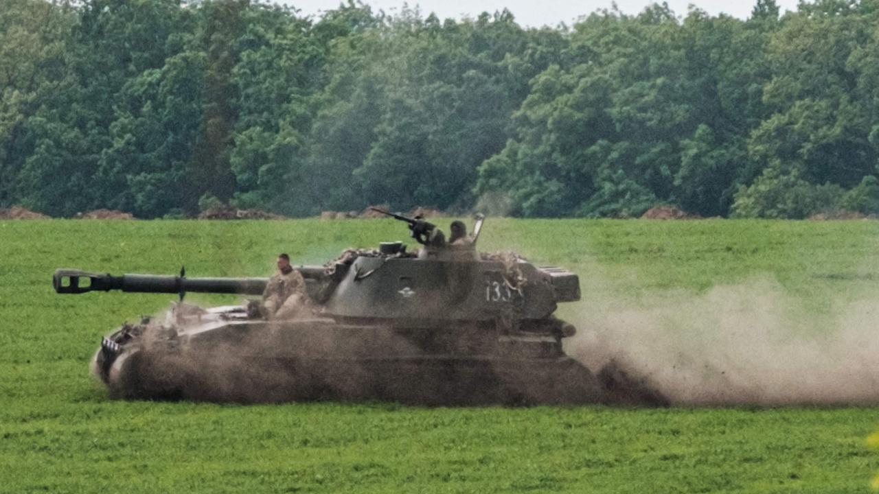 A Ukrainian self-propelled howitzer moves on a field near Sydorove, eastern Ukraine, on May 17, 2022. Picture: Yasuyoshi Chiba/AFP