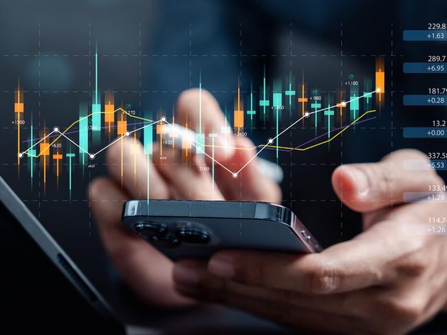 Businessmen investor think before buying stock market investment using smartphone to analyze trading data. investor analysis with stock exchange graph on screen. Financial stock market.