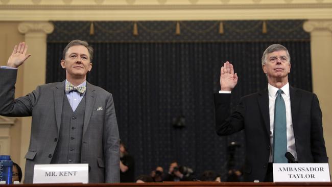 ‘A rancorous story’: George Kent and William Taylor are sworn in before the intelligence committee on Thursday. Picture: AP