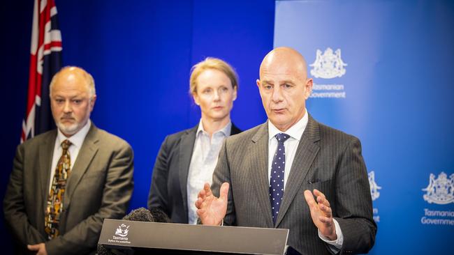 An Iranian man in Launceston is Tasmania's first confirmed coronavirus case. Premier Peter Gutwein, Minister Health Sarah Courtney and Director of Public Health Mark Veitch at a press conference at the Executive building in Hobart. Picture: RICHARD JUPE