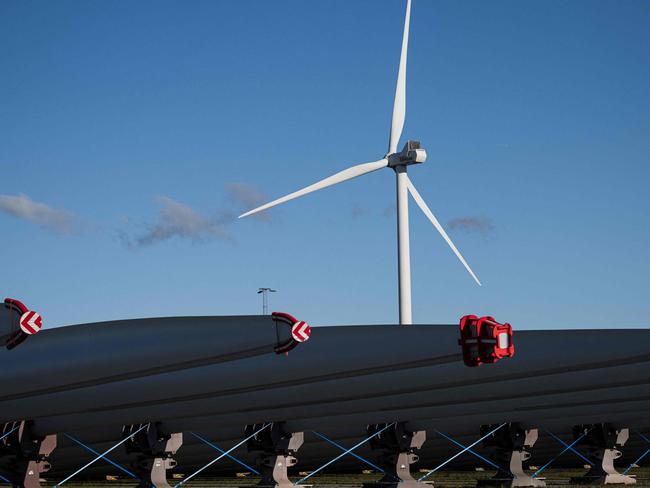 Wind turbine blades of Vestas, a global leader in sustainable energy solutions, are pictured at the Port of Odense, Denmark on October 15, 2024. On October 24, 2024, the countries bordering the North Sea are meeting in Denmark to their commitments to offshore wind power, a sector that is suffering from stiff competition from China. At the meeting, eight countries -- Denmark, Belgium, the Netherlands, France, Germany, Luxembourg, Norway and Ireland -- and the European Commission are expected to reach an agreement on the installation of some 20,000 wind turbines in the North Sea by 2050. (Photo by Jonathan NACKSTRAND / AFP)