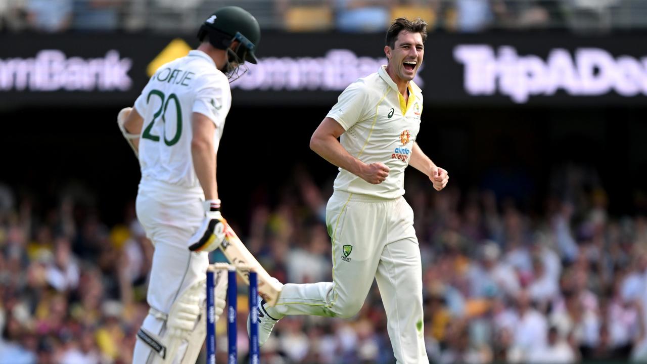 Pat Cummins of Australia celebrates taking the wicket of Anrich Nortje of South Africa. Getty