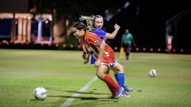 Grace Amidy of Darwin Olympic in action against Darwin Hellenic.