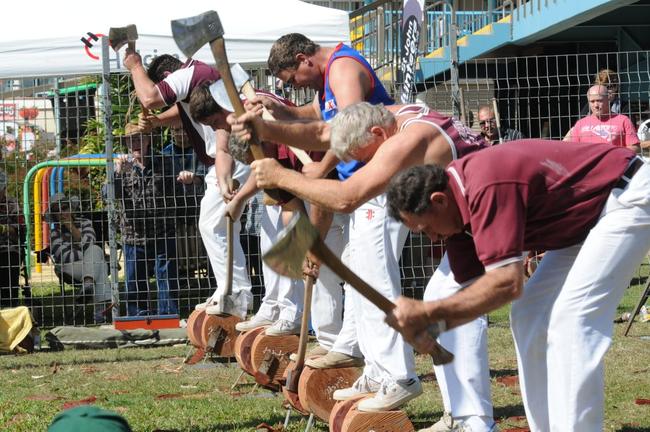 The woodchoppers do battle in the final of the 300mm Underhand Handicap at the Gympie show yesterday. Peter Tilney won with a time of 50 seconds. Picture: Craig Warhurst