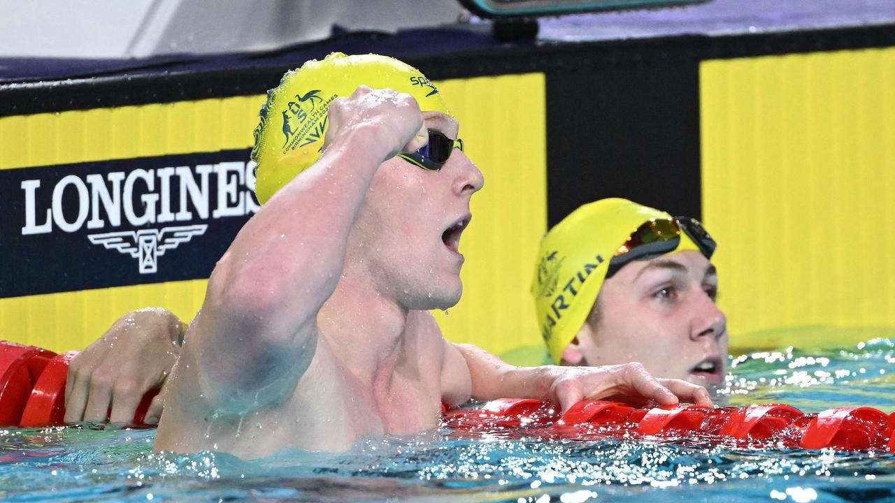 Col Pearse celebrates winning gold in the 100m butterfly. Picture: Andy Buchanan / AFP