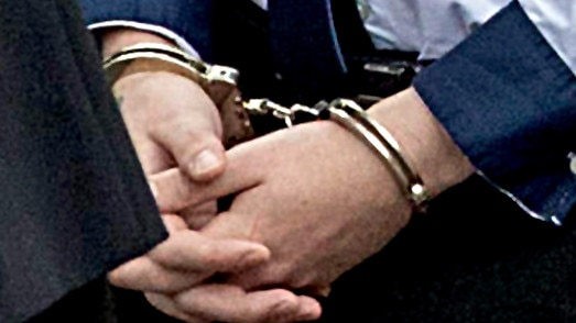 *FILE PIX* NCA NewsWire Photos: Editorial generic stock photo of person in handcuffs. Picture: NCA NewsWire