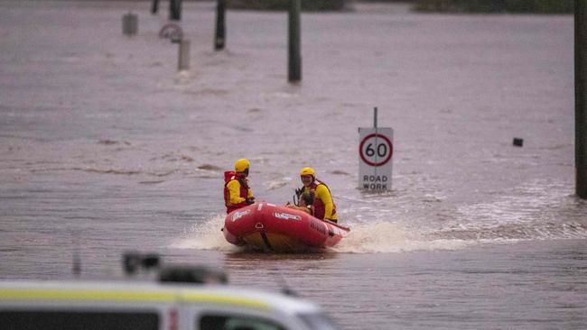 Surf life savers from Swansea Belmont SLSC were instrumental in the rescue effort. Picture: Liam Mendes / The Australian