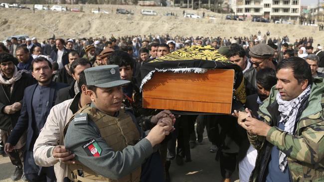 Men carry the coffin of a relative who died in last Saturday’s suicide attack in the Afghan capital Kabul. The attack was disguised by use of an ambulance packed with explosives. Picture: AP